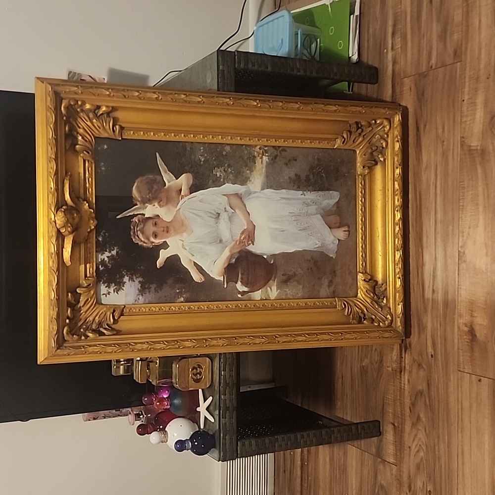 Beautiful vintage Angel wall picture  with solid frame . Appx 15 lbs. Gorgeous